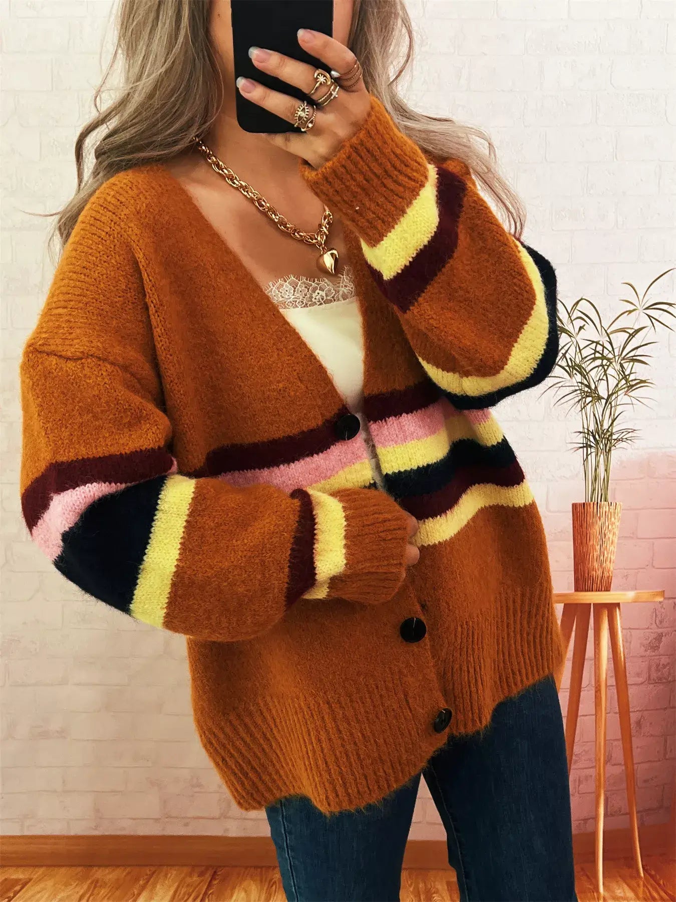 Ribbed Striped Cardigan for girls in warm colors, featuring a cozy design and modern striped pattern.