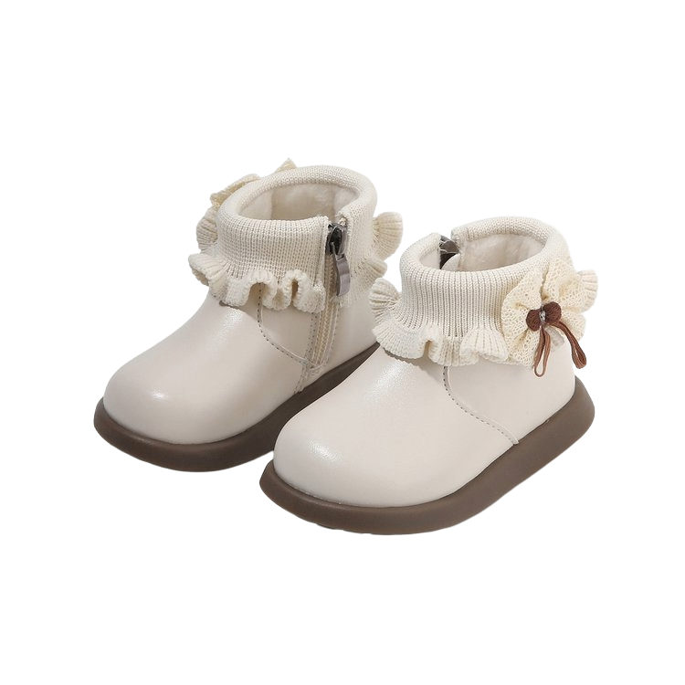 Baby boots with Fleece lining in cream color with ruffled cuffs and rubber sole for little adventurers.