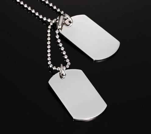 Dog Tag Pendant Necklace featuring a polished stainless steel design with a ball chain.