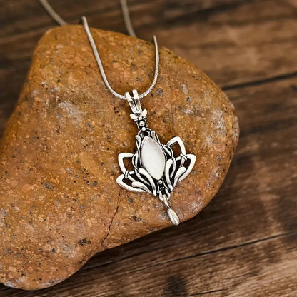 Retro Waterdrop-Shaped Hollow Lotus Pendant