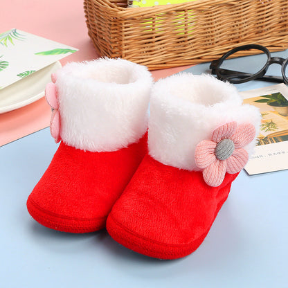 Fleece cotton sock shoes for Toddlers in red with white fluffy cuff and flower embellishment.