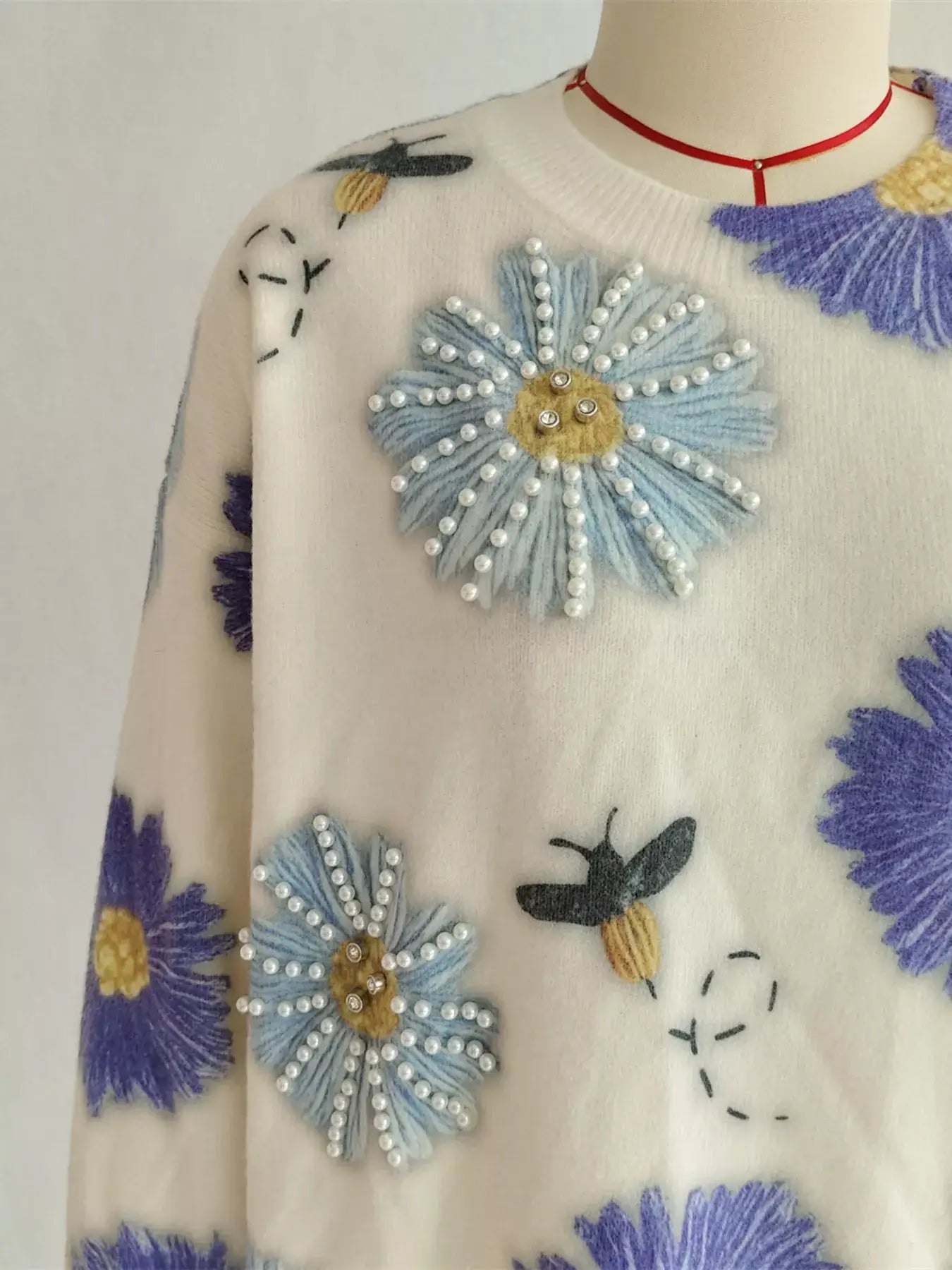 Kids round neck sweater shirt in floral print - full product view"