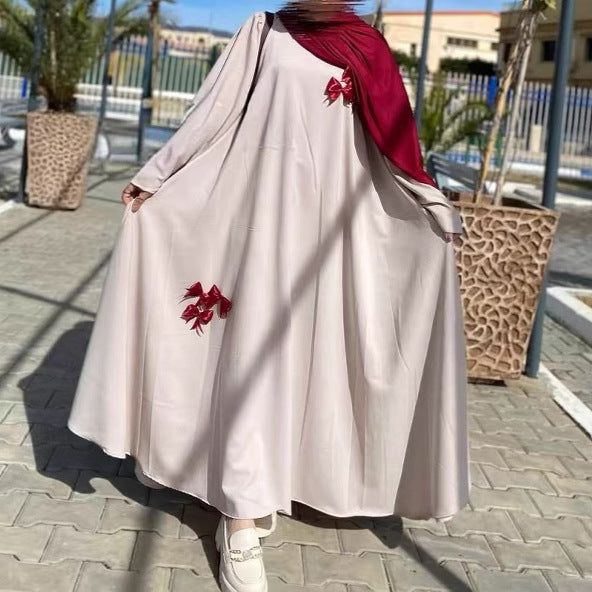elegant white abaya with floral embroidery