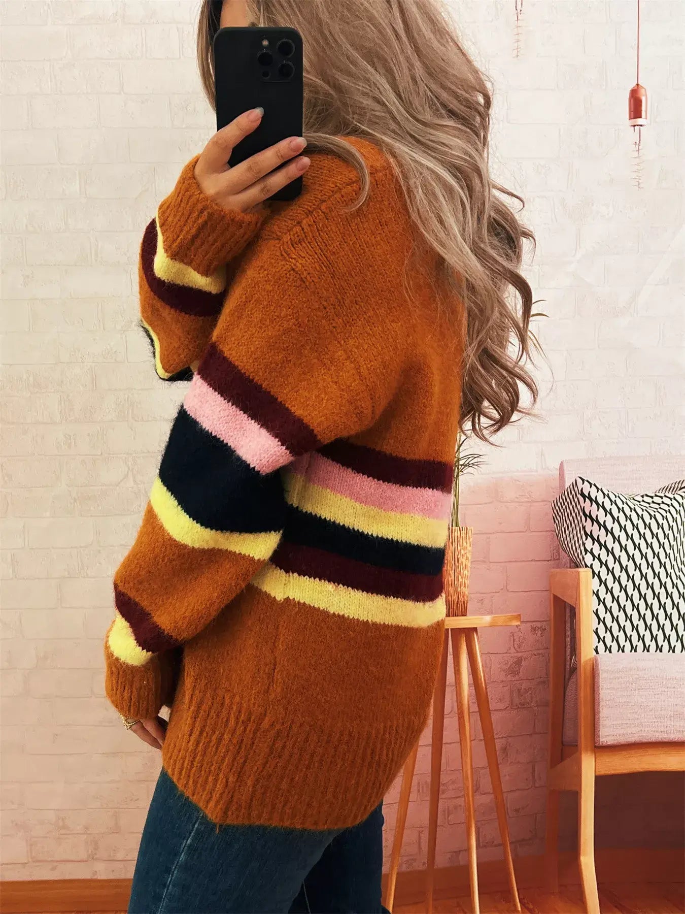 Stylish ribbed striped cardigan for girls, featuring modern striped pattern in warm colors, perfect for cozy outfits.