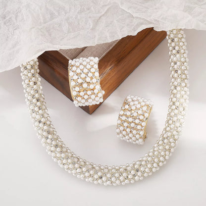 Pearl necklace and earring set worn by model elegant jewelry